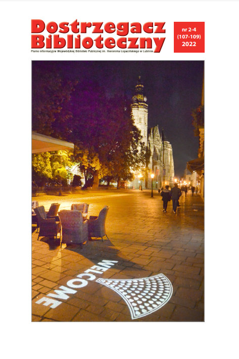 Okładka czasopisma Dostrzegacz Biblioteczny. Rynek w Koszycach nocą.